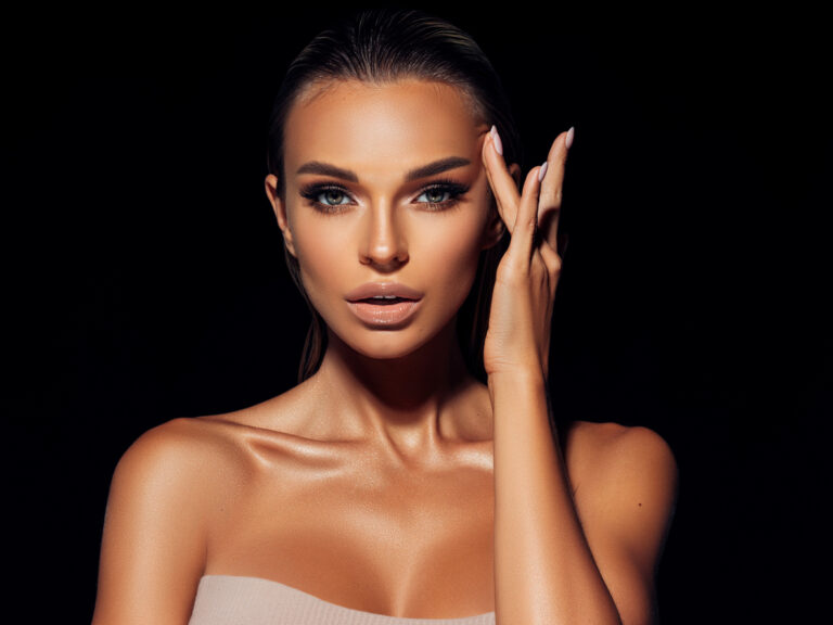 Beautiful Girl With Wet Hair Posing Against Black Background